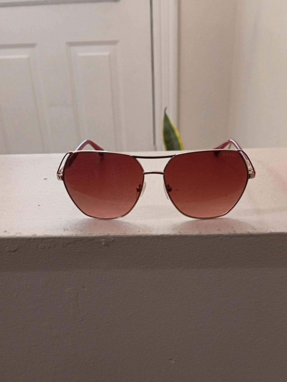 GUESS Gold-Frame Sunglasses with Pink Gradient Lenses
